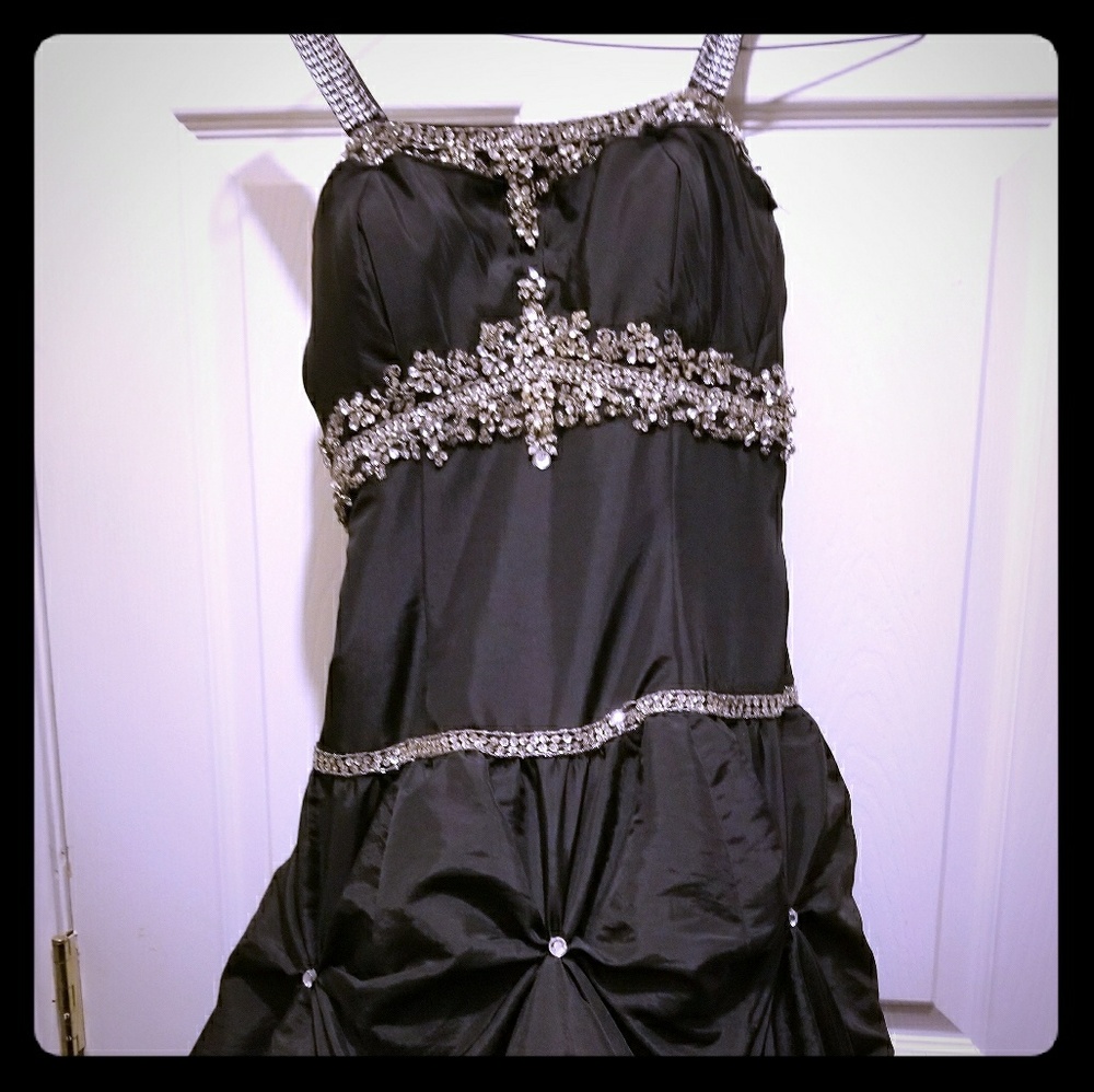 Alyce  designs formal dress.